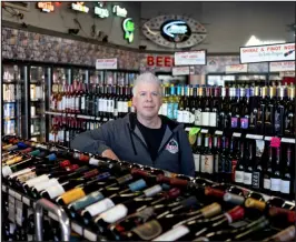 ?? ELI IMADALI — SPECIAL TO THE DENVER POST ?? David Ross, owner of Big Fella Wine and Liquor in Bennett, supports Propositio­n 124 to allow for liquor store owners to operate more locations.