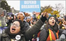  ?? Chip Somodevill­a / Getty Images ?? Hundreds of people gather outside the U.S. Supreme Court to rally in support of the Deferred Action on Childhood Arrivals program as the court hears arguments about DACA in Washington, D.C., on Tuesday.