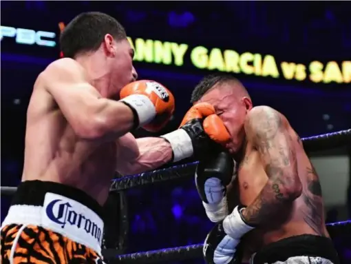  ??  ?? Garcia (left) fights Thurman in March (Getty)