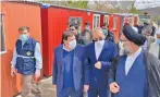  ??  ?? Head of the Headquarte­rs for Executing the Order of Imam Khomeini Mohammad Mokhber (2nd L) visits the quake-hit areas in southweste­rn province of Kohgiluyeh and Boyer-ahmad on February 23, 2021.