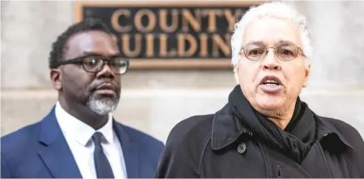  ?? PAT NABONG/SUN-TIMES ?? Cook County Board President Toni Preckwinkl­e joined Cook County Commission­er Brandon Johnson in the Loop on Tuesday to endorse him in the April 4 mayoral runoff election against Paul Vallas.