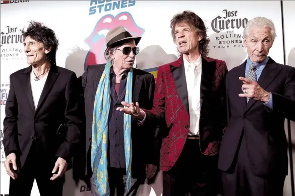  ?? MIKE SEGAR / REUTERS ?? The Rolling Stones (from left) Ronnie Wood, Keith Richards, Mick Jagger and Charlie Watts arrive for the exhibit in New York.