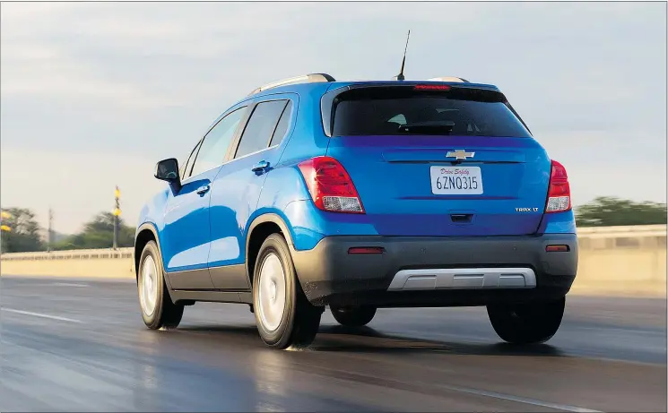  ?? — PHOTOS: GM CANADA FILES ?? The 2015 Chevrolet Trax is short, wide and tall. It rides on a wheelbase that’s only a few centimetre­s longer than the Chevrolet Sonic five-door hatchback.