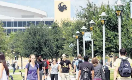  ?? RICARDO RAMIREZ BUXEDA/ORLANDO SENTINEL ?? With 60,000 students on campus last fall, the University of Central Florida is one of the largest colleges in the country. Many UCF employees have worked remotely since confirmed local cases of the virus began soaring in March, and some will start returning to campus June 1.