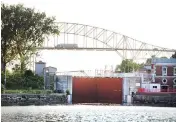  ?? PETER J. THOMPSON / NATIONAL POST ?? A transport truck makes its way over the Sault Ste. Marie Internatio­nal Bridge. The small twin border cities of Sault Ste. Marie, in Ontario and Michigan, are bidding for Amazon’s second headquarte­rs.