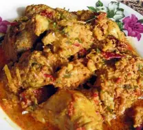  ?? — Filepic ?? In most versions of rendang, either beef or chicken is used alongside spices, herbs, coconut milk and kerisik.