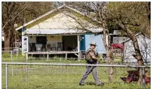  ?? JAY JANNER / AMERICAN-STATESMAN ?? A state trooper on March 21 secures Austin bomber Mark Conditt’s Pflugervil­le home, which an EMS crew visited the previous day, possibly alerting Conditt authoritie­s were after him.