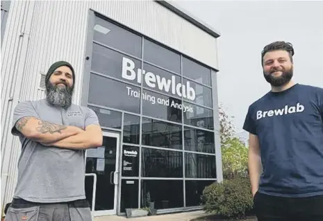  ??  ?? Gav Sutherland and Rich Hunt at Darwin Brewery and its neighbouri­ng training centre, BrewLab, in Sunderland Enterprise Park.