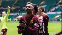  ?? ?? Louis Moult celebrates at the full-time whistle after Motherwell’s win over Celtic in 2015