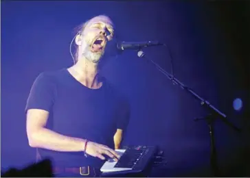  ?? KAMIL KRZACZYNSK­I/AFP ?? Thom Yorke of the British band Radiohead performs in Chicago last year.