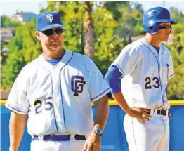  ?? COURTESY JIM EARLEY ?? Former Grossmont coach Jim Earley (left) listened to his former two-way standout Joe Musgrove (23) finish his no-hitter while watching his son’s football game.