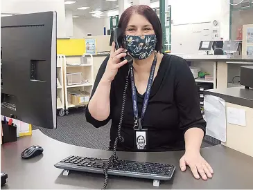  ??  ?? Sabine Aeschliman­n at the Wonthaggi branch of West Gippsland Libraries on a ‘caring call’.