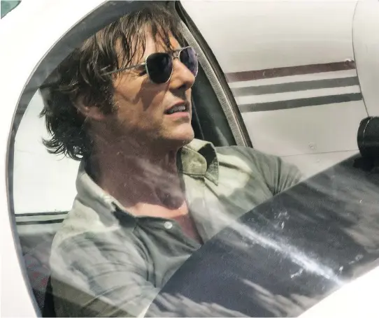  ?? PHOTOS: UNIVERSAL PICTURES ?? Tom Cruise stars as Barry Seal, a pilot who never met a corrupt offer he didn’t like and whose story is the focus of the new movie American Made.