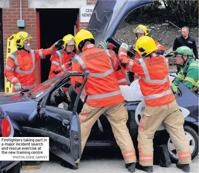  ?? PHOTOS: EDDIE GARVEY ?? Firefighte­rs taking part in a major incident search and rescue exercise at the new training centre