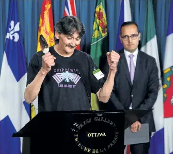  ?? SEAN KILPATRICK/THE CANADIAN PRESS ?? Jerry Natanine, community leader and former mayor of Clyde River, speaks during a press conference on Parliament Hill following a ruling at the Supreme Court of Canada in Ottawa on Wednesday.