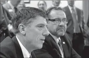  ?? AP/DANNY JOHNSTON ?? State Reps. Kelley Linck (left) and Joe Farrer present a bill Tuesday in the House Public Health, Welfare and Labor Committee creating a task force to study the state’s Medicaid program. “This is a Medicaid reform bill,” Farrer said.