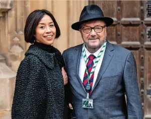  ?? Carl Court ?? ●●George Galloway outside Parliament with his wife, Putri Gayatri Pertiwi, after being sworn in