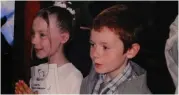  ??  ?? Saoirse Ronan (left) is pictured on her First Communion day with classmate Patrick McInerney