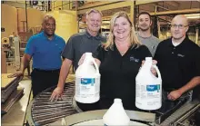  ?? CLIFFORD SKARSTEDT EXAMINER ?? Jennifer Meek, next to Asquith Williams, back from left, Jim Flieler, David Jones and Matt Strano of Charlotte Products Ltd. and the new Enviro-Solutions Terrazzo and Concrete Program on Friday.