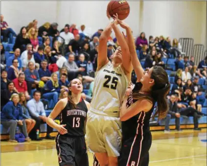  ?? AUSTIN HERTZOG - DIGITAL FIRST MEDIA ?? Spring-Ford’s Abby Goodrich (25) is fouled as she puts up a shot by Boyertown’s Jen O’Connor. Top right, Boyertown’s Victoria Boalton (4) splits the defense of Spring-Ford’s Rachel Christman, left, and Cassie Marte.