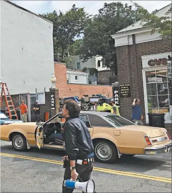  ?? ERIN AULOV/AP ?? Scenes for the new “Wonder Woman” movie were filmed on Wisconsin Ave. in the Georgetown section of D.C. in June. But “The Post,” starring Meryl Streep (below) was filmed in Brooklyn despite Washington setting.