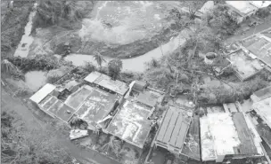  ??  ?? An aerial photo shows damage caused by Hurricane Maria in San Juan, Puerto Rico. REUTERS/DroneBase.