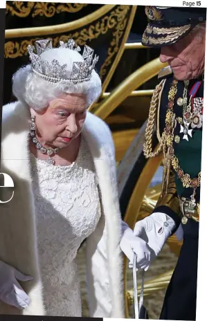  ?? Picture: GETTY ?? Taking the strain: A steadying hand from Prince Philip for the Queen at the State Opening of Parliament this week