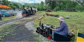  ??  ?? Above: The temporary miniature railway's 0-4-0T Ellis greets Winifred and its coach.
THOMAS HAYNES/ BLR