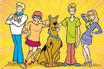  ??  ?? SAVING SCOOBY: Top: John Duncan with the banner he made from a sheet. Above: The ghost-busting Mystery Inc gang – Fred, Velma, Scooby-doo, Shaggy and Daphne.
