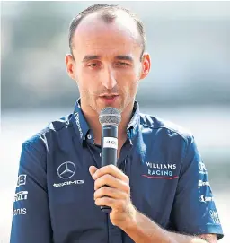  ?? Picture: Getty Images. ?? Robert Kubica delivers his presentati­on to the media.