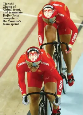  ??  ?? Tianshi Zhong of China, front, and teammate Jinjie Gong compete in the Women's team sprint
