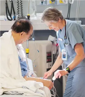  ?? JASON PAYNE/PNG ?? St. Paul’s Hospital emergency room nurse Alice McLaren worked in the ER Wednesday as the B.C. Nurses’ Union demanded a formal review of the staffing in the emergency department.