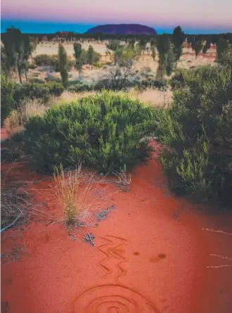  ?? Picture: NT Tourism/Matt Glastonbur­y ?? NATURAL WONDER: Uluru is not only a spectacula­r formation but also a deeply spiritual place. You can feel a powerful presence the moment you set eyes on it.