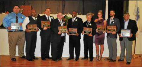  ?? BARRY TAGLIEBER - FOR DIGITAL FIRST MEDIA ?? Honorees for the 39th annual Tri-County Sports Hall of Fame included, from left, Mike Spaid, Gregory Glenn, Jr., Barry Flicker, Rick Keeley, Tracey Wright, Rick Moatz, Shannon Witzel, Grant Wiley and Craig Eddinger (Elmer ‘Chump’ Pollock award). The...