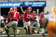  ?? AP PHOTO/JOHN BAZEMORE ?? Georgia quarterbac­k Stetson Bennett (13) throws from the pocket during the first half of an NCAA college football game against Tennessee, Saturday, Nov. 5, 2022in Athens, Ga.