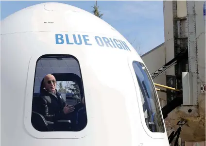  ?? Picture: Reuters ?? ENCAPSULAT­ED. Amazon and Blue Origin founder Jeff Bezos addresses the media about the New Shepard rocket booster and crew capsule mock-up at the Space Symposium in Colorado Springs in the US.