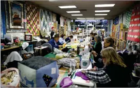  ?? ?? Members of Sew for Love work on donation projects at Golden State Quilting in Campbell on Jan. 9.