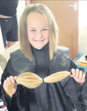  ??  ?? Kaycee Rees, aged nine, from Tumble, has cut her hair for charity.