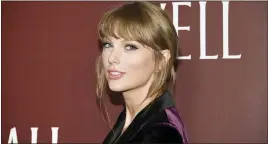  ?? ?? Writer-director Taylor Swift attends a premiere for the short film “All Too Well” at AMC Lincoln Square 13 on Friday in New York.