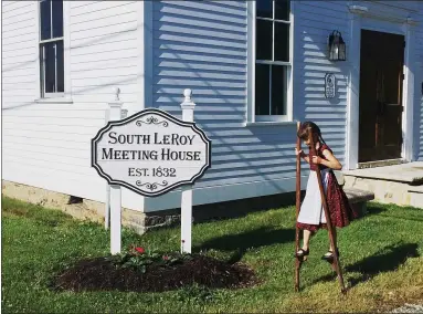  ?? CHAD FELTON — THE NEWS-HERALD ?? Leroy Township resident Lena Hanusosky, 8, demonstrat­es her stilt-walking skills on the property of one of Lake County’s most historic sites.