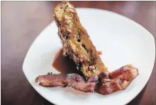  ??  ?? Salted Caramel Bacon Bread Pudding serves at least eight. It can also be cut into appetizer-size portions.