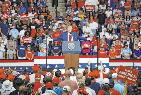  ?? Sue Ogrocki The Associated Press ?? President Donald Trump speaks Saturday during a campaign rally at the BOK Center in Tulsa, Okla.
