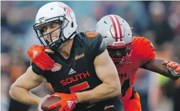  ??  ?? South team quarterbac­k Kyle Lauletta avoids a sack by North outside linebacker Dewey Jarvis Saturday during the Senior Bowl. The pivot more than held his own against high-profile quarterbac­ks like Baker Mayfield and Josh Allen. — AP