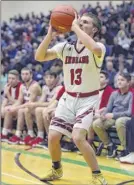  ??  ?? Glens Falls’ Trent Girard (left), and Joseph Girard III (right) combined for 15 3-pointers during their Class B quarterfin­al against Johnstown.