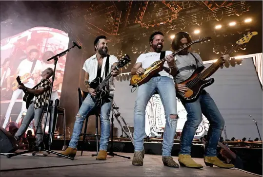  ?? PHOTOS: WILL LESTER — STAFF PHOTOGRAPH­ER ?? Old Dominion, shown in April at the Stagecoach Country Music Festival in Indio, is touring in support of its album “Memory Lane” and its chart-topping title track.