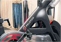  ??  ?? A Peloton stationary bike sits on display at one of the fitness company’s studios in New York City.