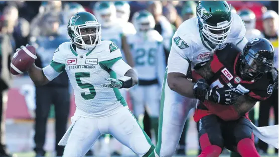  ?? PHOTOS: JUSTIN TANG/THE CANADIAN PRESS ?? Saskatchew­an Roughrider­s quarterbac­k Kevin Glenn unleashes a pass during the second half in the Eastern semifinal in Ottawa on Sunday.