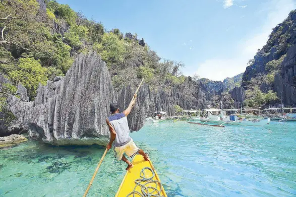  ?? Photo by FERNAN NEBRES ?? Discover the Philippine­s, and then tell the world about it: Coron, Palawan.