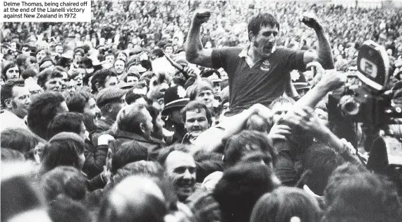  ?? ?? Delme Thomas, being chaired off at the end of the Llanelli victory against New Zealand in 1972