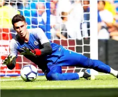  ??  ?? Chelsea’s Kepa Arrizabala­ga during the warm up before the match. — Reuters photo